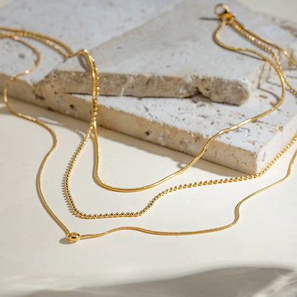 Layered Gold Chain Necklace with Solitaire