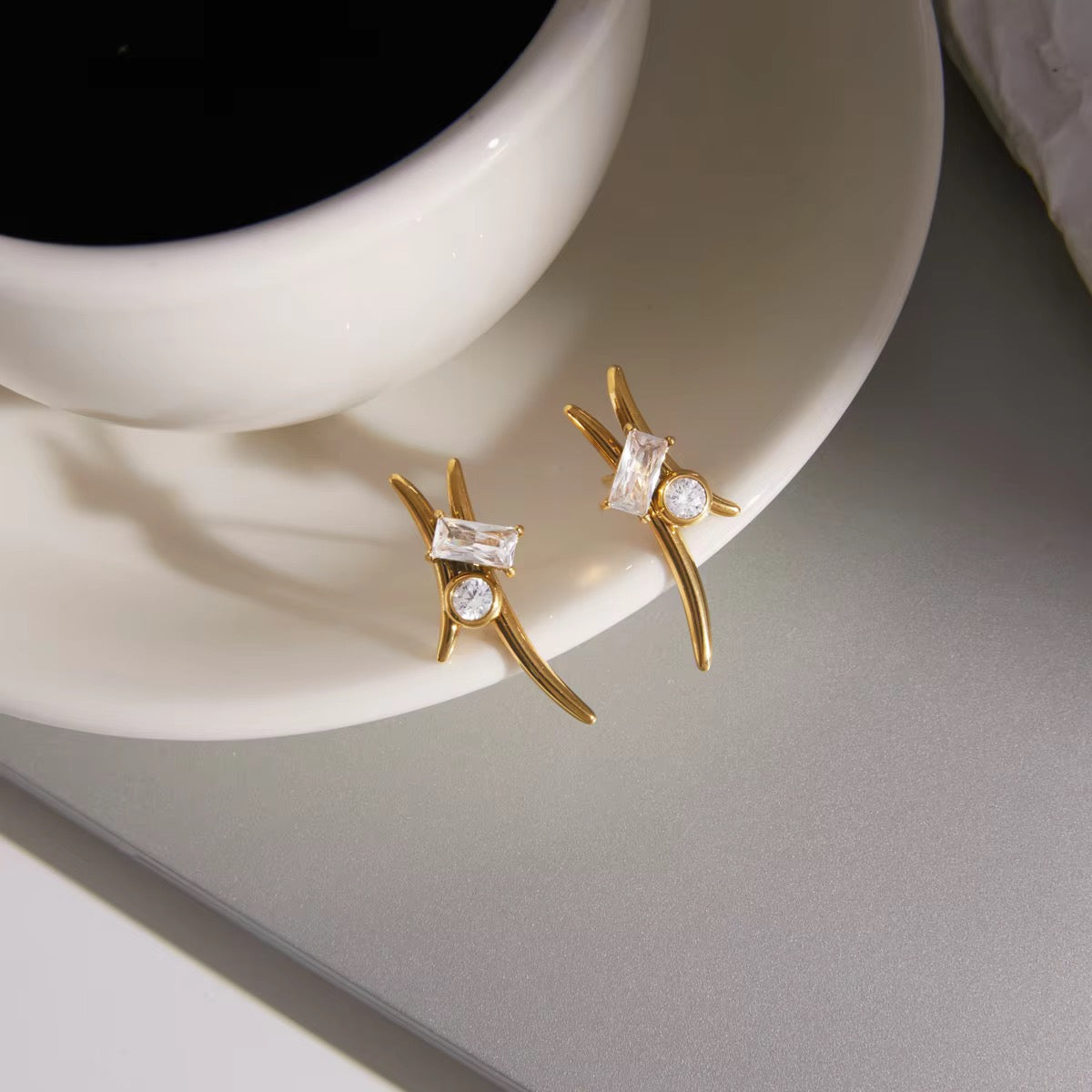 Astra Geometric Cross Earrings